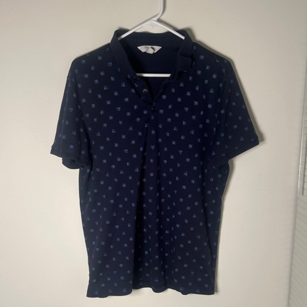 Calvin Klein Dark Blue Polo with Subtle Pattern
